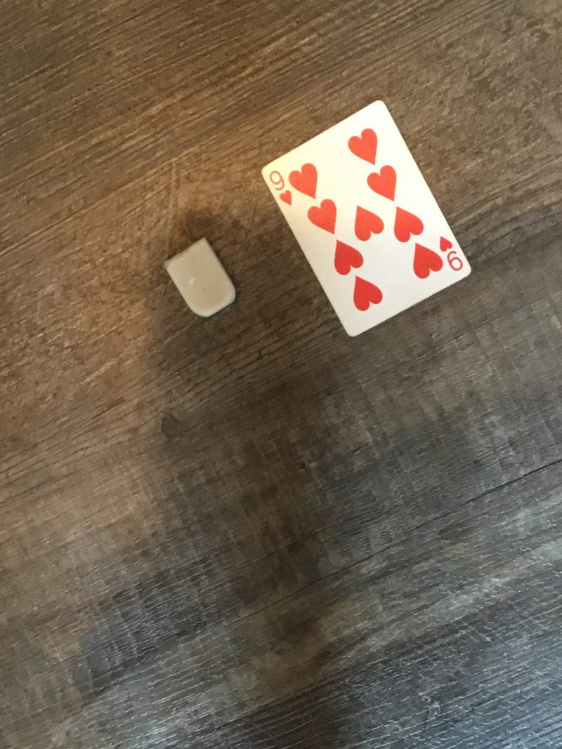 Half an eraser and a nine of hearts